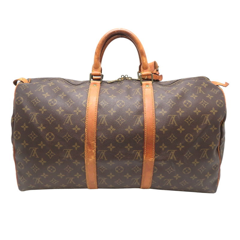 Louis Vuitton Keepall 50 nærbilde av navnelapp i lyst skinn med Made in France-stempel
