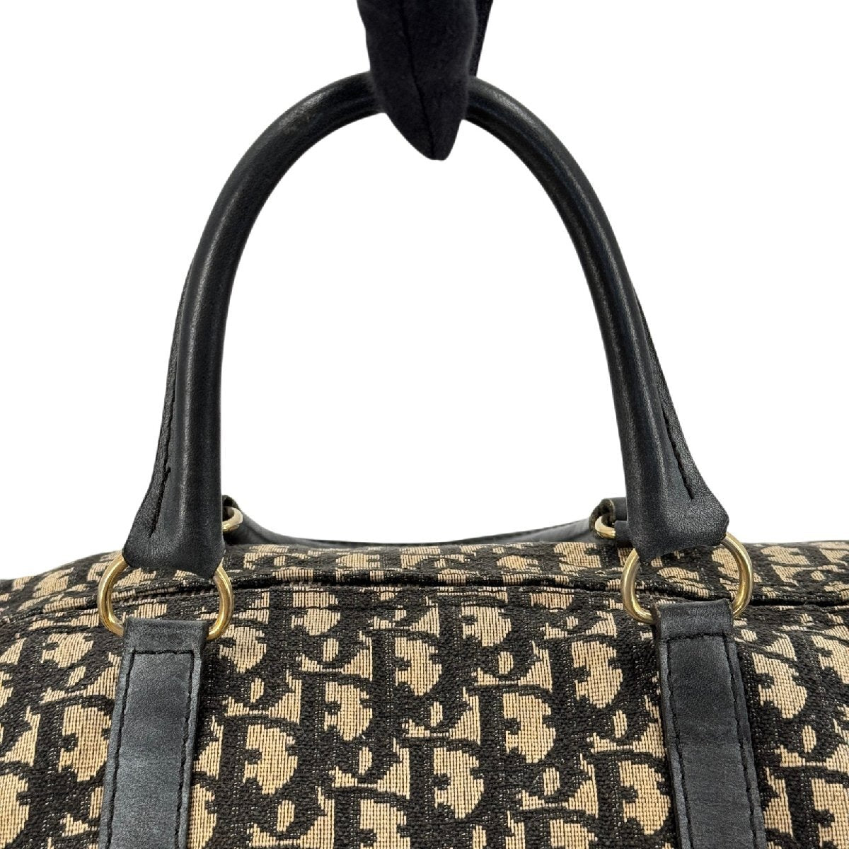 Dior Trotter Boston 40 innside med lyst fôr, glidelås i messing og innvendig lomme med flekker