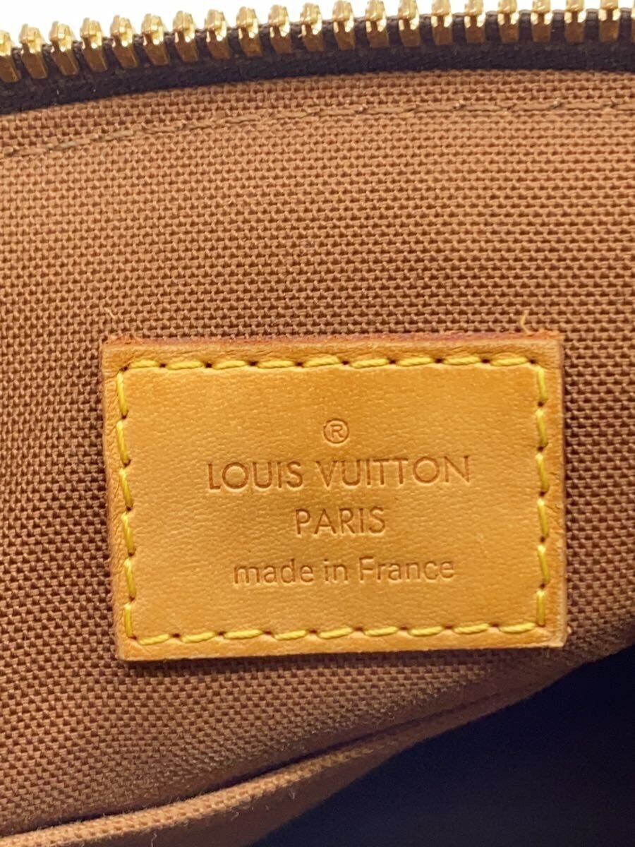 Louis Vuitton Tivoli PM – nærbilde av håndtak i lyst skinn