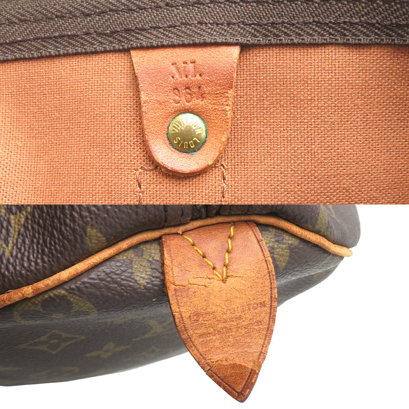 Louis Vuitton Keepall 50 nærbilde av håndtak med sprekklinjer i skinnet