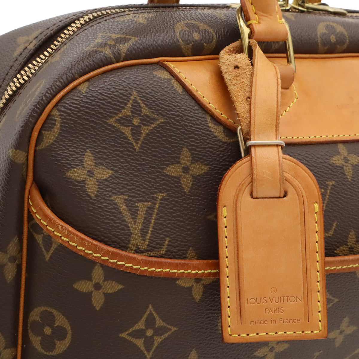 Louis Vuitton Deauville – nærbilde av glidelåstrekkere i gull